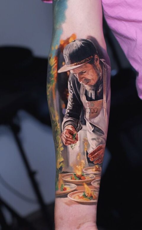 Color realism tattoo — chef portrait with flambé